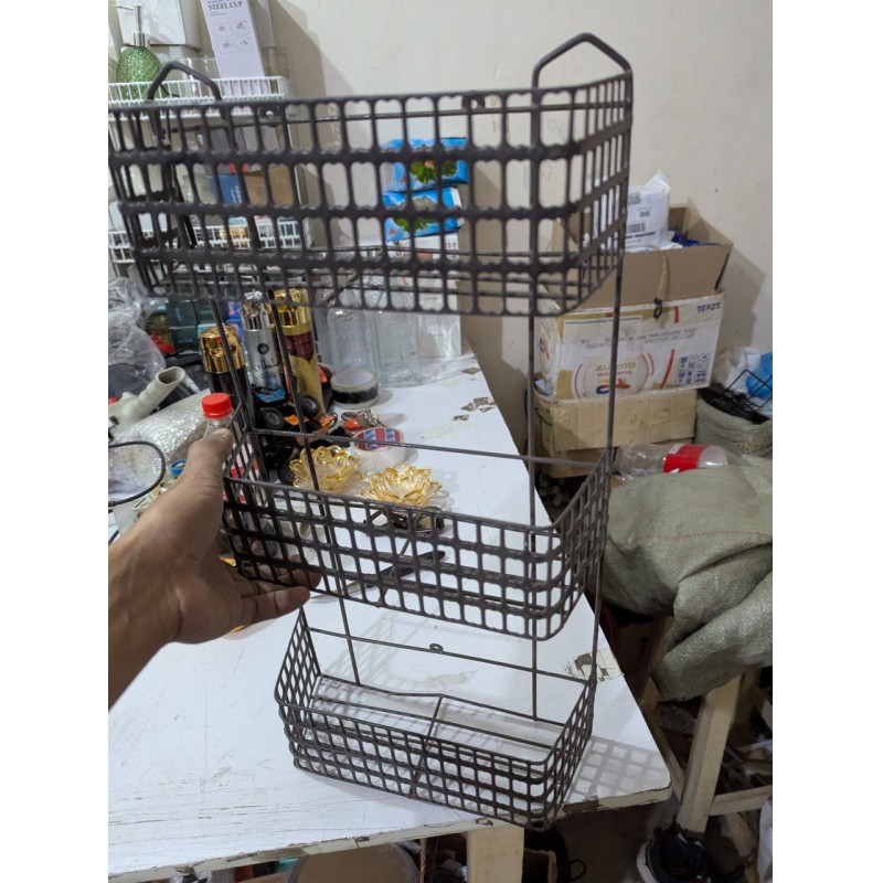 Picture of Maximize Your Living Space with this Durable 3-Tier Metal Wire Basket Storage Rack, a Multipurpose Freestanding or Wall-Mounted Organizer Ideal for Efficiently Storing Bathroom Toiletries, Kitchen Spices, and Essential Household Items.-Black