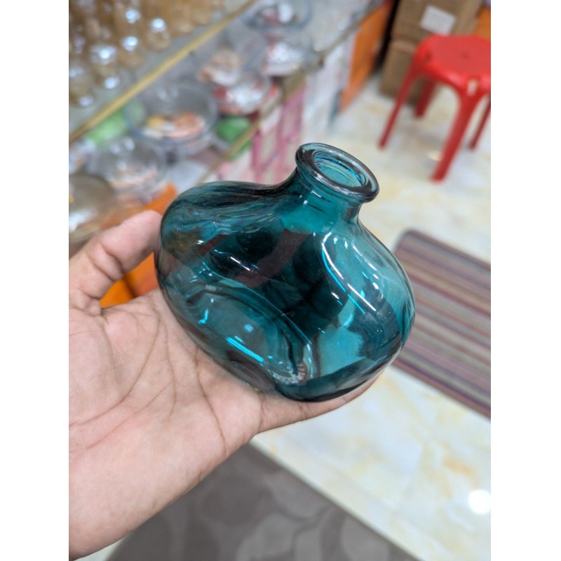 Picture of Elegant Handcrafted Teal Blue Recycled Glass Vase with Organic Bulbous Shape and Lipped Opening, Perfect Eco-Friendly Mediterranean Style Decorative Flower Bottle for Modern Sustainable Home Decor Accents and Unique Artisanal Gifting.-Multicolor