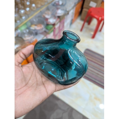 Picture of Elegant Handcrafted Teal Blue Recycled Glass Vase with Organic Bulbous Shape and Lipped Opening, Perfect Eco-Friendly Mediterranean Style Decorative Flower Bottle for Modern Sustainable Home Decor Accents and Unique Artisanal Gifting.-Multicolor
