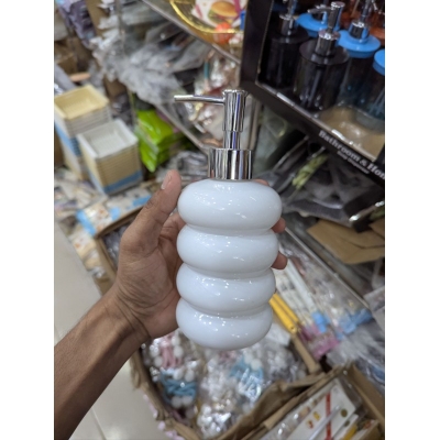 Picture of Elegant Modern White Ceramic Soap Dispenser with Chrome Pump: A Stylish Multi-Layer Stacked Bubble Design Liquid Hand Soap, Lotion, and Shampoo Bottle Perfect for Contemporary Bathroom Vanity or Kitchen Sink Decor Aesthetics.-White