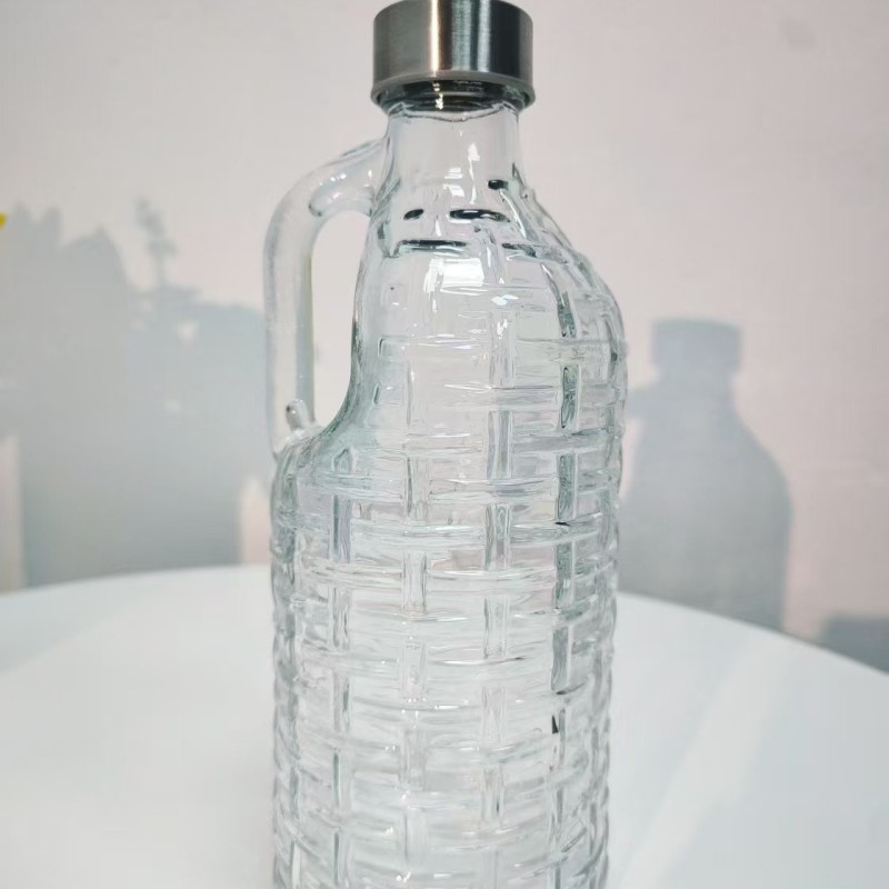 Picture of 1000ml Textured Borosilicate Glass Beverage Bottle with Handle – Leak-Proof, Freezer-Safe, Food-Grade Stainless Steel Cap for Water, Juice & Daily Hydration.-Multicolor