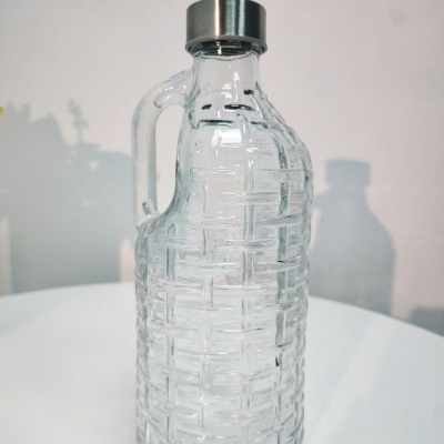 Picture of 1000ml Textured Borosilicate Glass Beverage Bottle with Handle – Leak-Proof, Freezer-Safe, Food-Grade Stainless Steel Cap for Water, Juice & Daily Hydration.-Multicolor