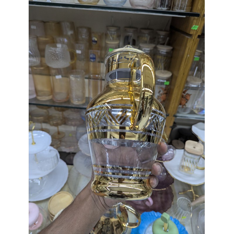 Picture of Premium Arabian Style Gold Decal Glass Pitcher with Lid for Serving Cold Water, Iced Tea, and Juice, Featuring Heat-Resistant Borosilicate Glass and Elegant Greek Key Patterns for Luxury Home Dining.-Gold
