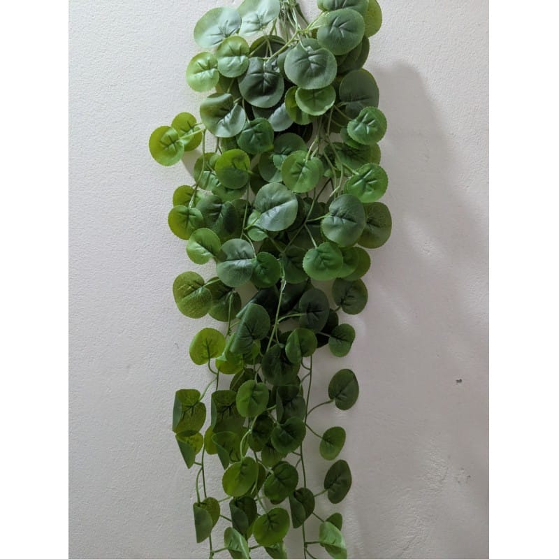 Picture of Premium Artificial Hanging Vine Plant for home decoration features realistic green leaves and long trailing stems perfect for adding a natural touch to your indoor living spaces without any daily maintenance.-Green