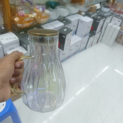 Picture of Premium Glass Water Pitcher with Stainless Steel Lid and Spout, Heat Resistant 2-Litre Modern Kettle Carafe for Hot and Cold Beverages, Dishwasher Safe Round BPA-Free Design with Anti-Corrosion Material and Strong Handle-multicolor