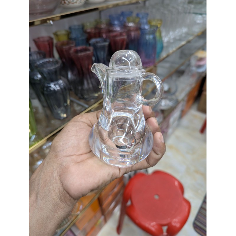 Picture of Premium Clear Glass Cruet Dispenser with Ergonomic Handle and Stopper for Serving Olive Oil Vinegar or Liturgical Water and Wine in Kitchens Restaurants and Church Services Featuring a Durable Leakproof Pouring Spout-Multicolor
