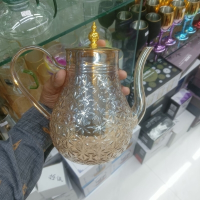 Picture of High Borosilicate Resistant tea kettlee golden colour stainless steem lid and infuser , Large Capacity, High Aesthetic Value, Household Teapot, Juice, Beverage, Light Waight 620 ml-Gold