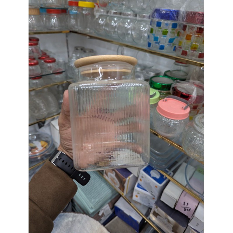 Picture of Airtight Glass Cookie Jar with Bamboo Lid for Kitchen Storage 1000ml Capacity Ribbed Textured Clear Glass Container Perfect for Storing Biscuits Sweets Dry Fruits Tea Leaves and Snacks Efficiently Online.-Multicolor