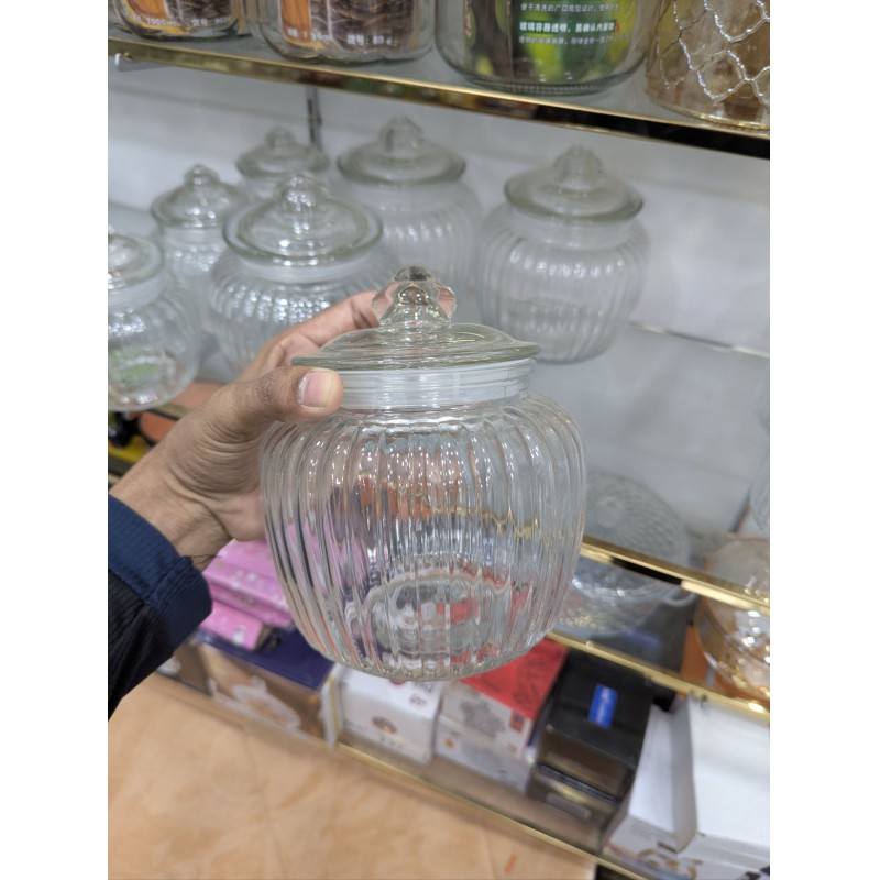 Picture of Premium Clear Ribbed Glass Storage Jar with Airtight Lid for Kitchen Pantry Organization Stylish Transparent Cookie Canister for Countertop Decorative Candy Pot Jar with Secure Seal for Preserving Food Freshness Quality.-Multicolor