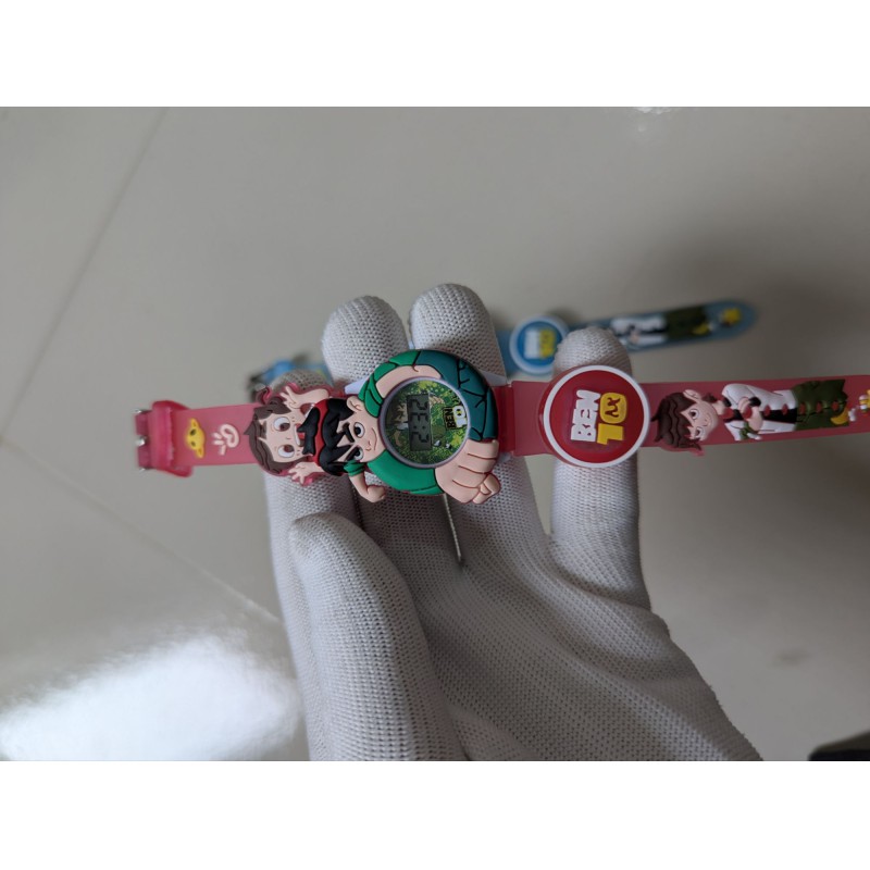Picture of Ben 10 Kids Digital Watch featuring a unique rotating spinner design with colorful lighting and musical effects, perfect as a fun and functional toy-like wristwatch for boys and girls aged 4-12.-Red