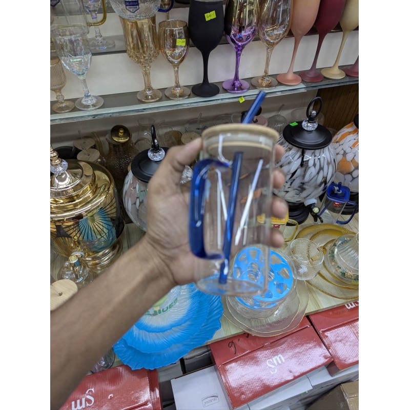 Picture of Premium Borosilicate Glass Pookie Mug with Blue Handle and Matching Glass Straw Featuring Elegant Blue Flower Charm and Eco Friendly Bamboo Lid with Airtight Silicone Seal for Hot or Cold Beverages.-Multicolor
