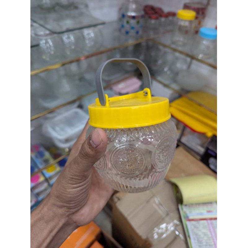 Picture of Premium Patterned Glass Kitchen Storage Jar with Airtight Yellow Lid and Metal Carrying Handle, Large Capacity Transparent Food Container for Fresh Cereal, Cookies, Snacks, and Pantry Organization for Modern Home Decor.-Multicolor
