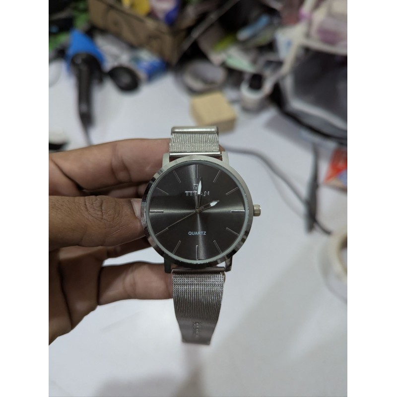 Picture of Men’s Quartz Analog Watch featuring a Premium Anthracite Dial and Stainless Steel Mesh Strap with a Slim Round Case Design perfect for Formal Business Meetings and Everyday Casual Wear for Professionals.
High-Quality Wrist Watch for Men with Durable Silve-Silver