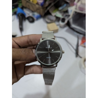 Picture of Men’s Quartz Analog Watch featuring a Premium Anthracite Dial and Stainless Steel Mesh Strap with a Slim Round Case Design perfect for Formal Business Meetings and Everyday Casual Wear for Professionals.
High-Quality Wrist Watch for Men with Durable Silve-Silver