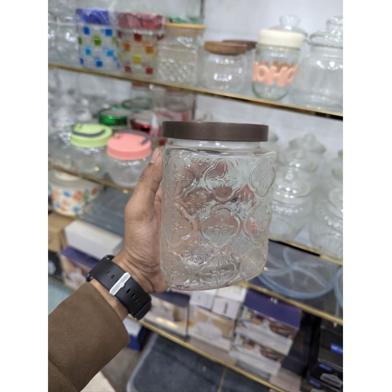 Picture of Premium Airtight Glass Cookie Jar with Decorative Brown Metal Lid for Kitchen Countertop Storage of Fresh Homemade Chocolate Chip Biscuits, Snacks, and Pantry Essentials with Retro Embossed Floral Pattern Style Design.-Multicolor