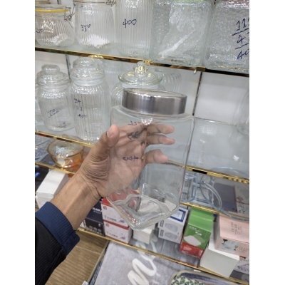 Picture of High-quality square glass storage jar with airtight stainless steel metal lid for kitchen pantry organization of dry food items like snacks pulses spices grains and coffee beans for fresh long-lasting storage.-Multicolor
