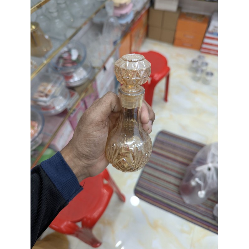 Picture of Premium Vintage Amber Crystal Glass Decanter with Diamond-Cut Base and Matching Geometric Stopper for Whiskey, Wine, or Spirits; Elegant Decorative Vessel Featuring Lead-Free Hand-Painted Gold Detailing for Luxury Home Barware Collection-Gold