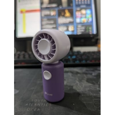 Picture of LIVO LV-2610 Cute Mini Fan is a powerful turbo-powered handheld rechargeable cooling device with 11000 r/min motor speed, ideal for personal travel use, outdoor activities, office desks, and quick summer heat relief.-Multicolor