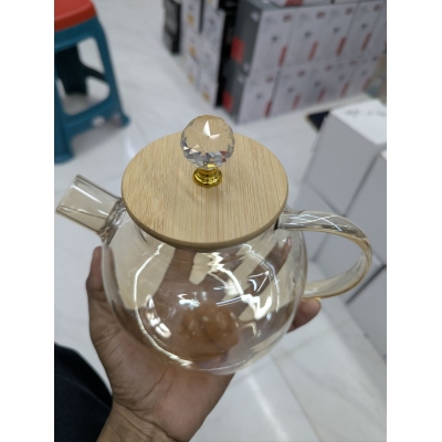 Picture of Premium Heat Resistant Borosilicate Glass Teapot with Natural Bamboo Lid, Crystal Top Knob, and Removable Spout Filter - 1000ml Large Capacity Stovetop Safe Clear Tea Kettle for Loose Leaf and Blooming Tea-Gold