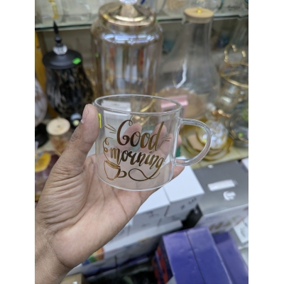 Picture of Clear Borosilicate Glass Coffee Mug with Gold Good Morning Print, Heat Resistant Transparent Tea Cup for Hot and Cold Beverages, Lightweight Fireproof Breakfast Tumbler for Home Kitchen Use.-Multicolor