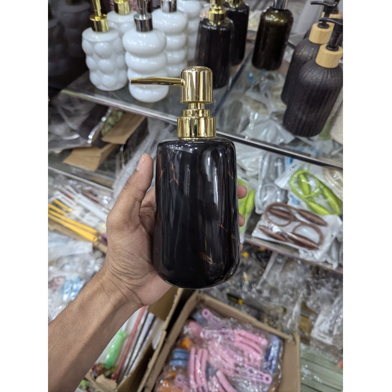 Picture of Luxury Black Marble Ceramic Soap Dispenser with Durable Gold Pump for Bathroom and Kitchen Decor, Refillable Hand Wash Liquid Bottle, High-Quality Elegant Lotion Container, Stylish Minimalist Home Accessory for Modern Countertop Organization.-Black
