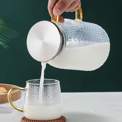 Picture of Glass Water Pitcher with Filter Lid and Pouring Spout Heat Resistant Glass Carafe for Hot Cold Beverages Homemade Ice Tea Bottle 2000 ml-Multicolor