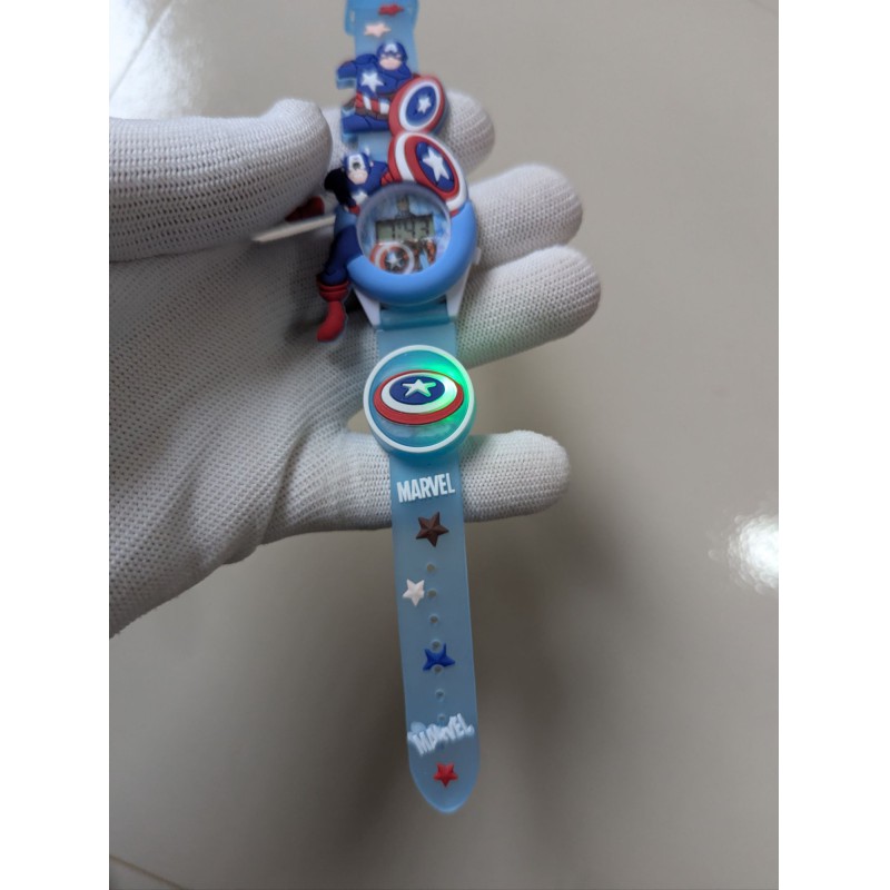Picture of Marvel Avengers Captain America Digital Watch for Boys with 6 Image Projection, 3D Character Design, Blue Silicone Strap, Musical LED Light Feature, and Interactive Digital Clock Display for Kids Birthday Gift.-Blue