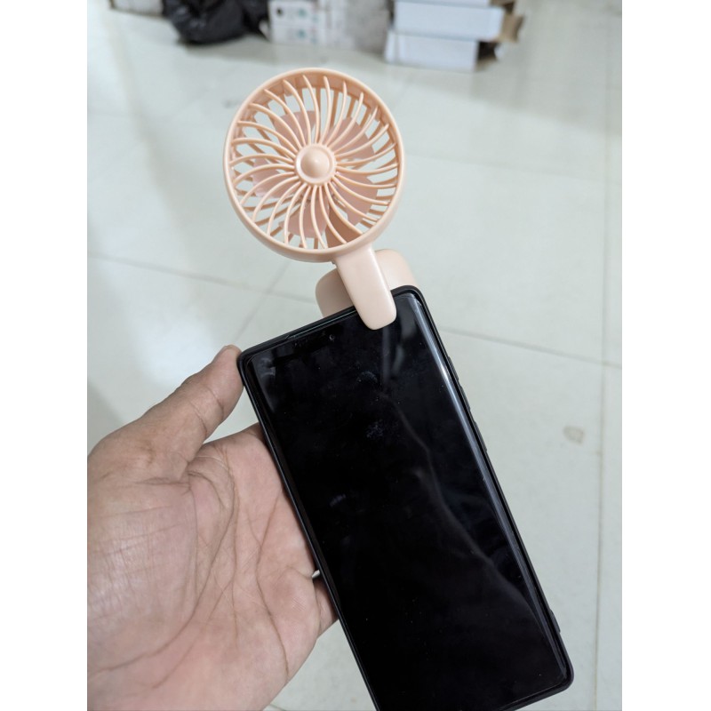 Picture of Portable USB rechargeable mini handheld fan for mobile phones and laptops featuring a compact design quiet operation three adjustable speed modes and a stable clip for hands-free cooling during travel or work.-Multicolor