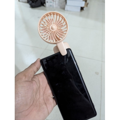 Picture of Portable USB rechargeable mini handheld fan for mobile phones and laptops featuring a compact design quiet operation three adjustable speed modes and a stable clip for hands-free cooling during travel or work.-Multicolor