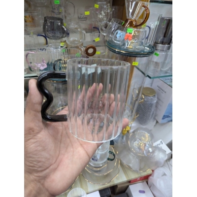 Picture of Madame Coco Rona Borosilicate Glass Mug 370ml with Unique Black B-Shaped Wavy Handle Heat Resistant Fluted Ribbed Clear Coffee Cup for Hot Tea Latte Cappuccino Aesthetic Modern Minimalist Glassware Home Decor-Multicolor