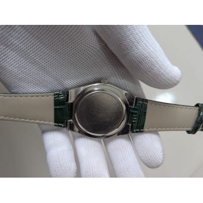 Picture of Men's Quartz Watch with Premium Green Leather Strap, Rose Gold Bezel, and Olive Green Dial Business Fashion Wristwatch Featuring Luminous Hands, Date Week Display, and Daily Water Resistance Features.-Green