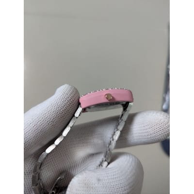Picture of Luxury Women's Quartz Watch with Pink Dial and Silver Stainless Steel Band Featuring a Sparkling Rhinestone Bezel for Elegant Style and Precise Timekeeping Perfect for Any Special Occasion or Daily Wear.-Multicolor