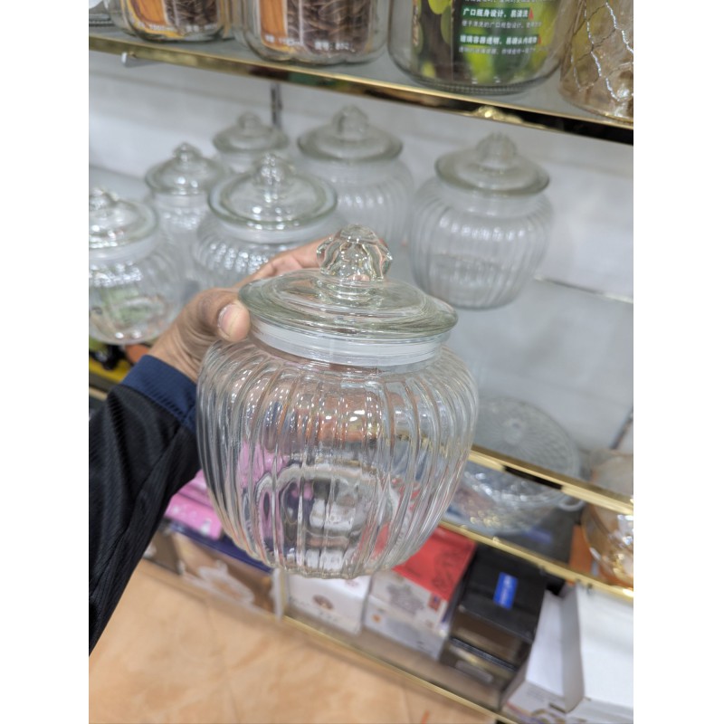 Picture of Premium Clear Ribbed Glass Storage Jar with Airtight Lid for Kitchen Pantry Organization Stylish Transparent Cookie Canister for Countertop Decorative Candy Pot Jar with Secure Seal for Preserving Food Freshness Quality.-Multicolor