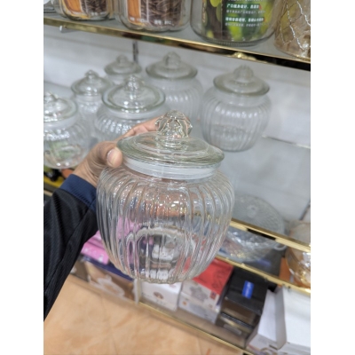 Picture of Premium Clear Ribbed Glass Storage Jar with Airtight Lid for Kitchen Pantry Organization Stylish Transparent Cookie Canister for Countertop Decorative Candy Pot Jar with Secure Seal for Preserving Food Freshness Quality.-Multicolor