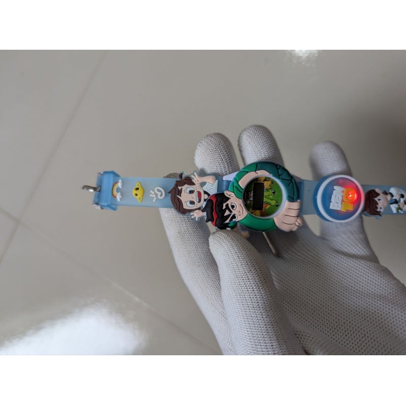 Picture of Kids Ben 10 Digital Wrist Watch with 3D Cartoon Character Strap Multicolor LED Flashing Lights and Music Rotating Spinner Dial Design Perfect Birthday Gift for Boys and Girls Ages 3-10.-Multicolor