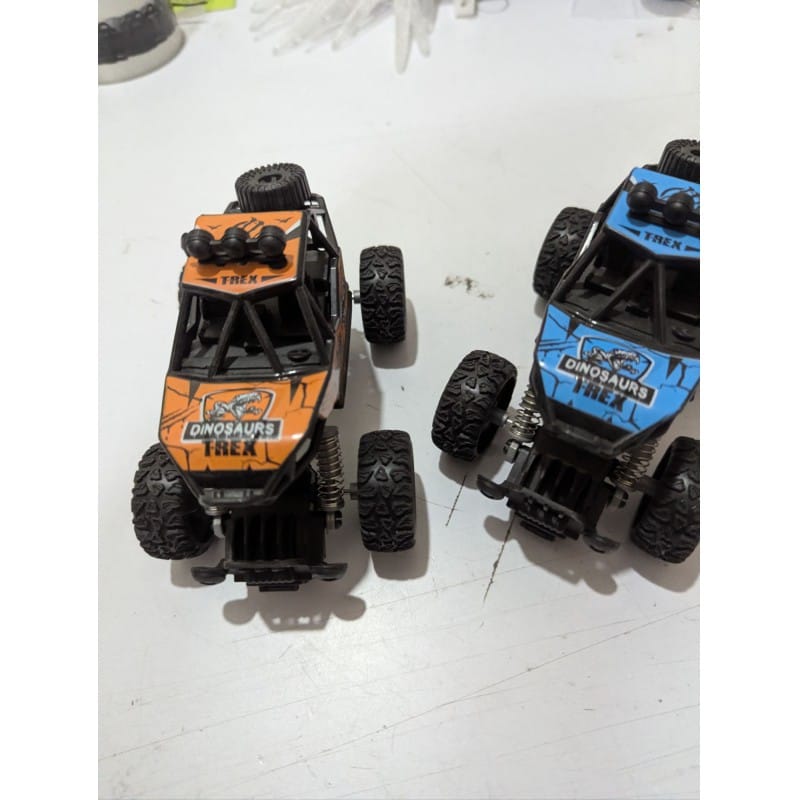 Picture of Durable  Pull Back Monster Truck with High Elastic Metal Shock Absorbers Manual Spring System Off-Road Climbing Car Toy for Toddlers Kids Boys Girls Ages 3 to 10 Years Old.-Multicolor