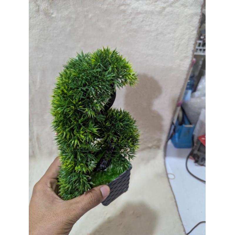 Picture of 10-Inch Green Artificial Bonsai Tree with Unique Elephant Trunk Design in a Stylish Black Plastic Vase-Green
