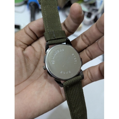 Picture of Men's Sports Analog Quartz Watch featuring a Stylish Green Dial and Durable Olive Green Nylon Fabric Strap, Perfect for Casual Wear and Outdoor Activities for Fashionable Men in Bangladesh Today.-Green
