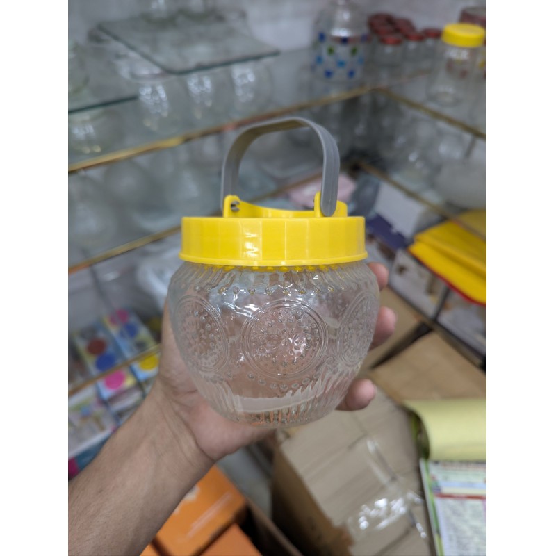 Picture of Premium Patterned Glass Kitchen Storage Jar with Airtight Yellow Lid and Metal Carrying Handle, Large Capacity Transparent Food Container for Fresh Cereal, Cookies, Snacks, and Pantry Organization for Modern Home Decor.-Multicolor