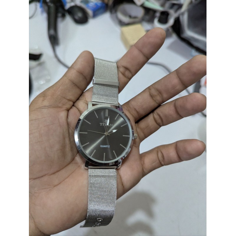 Picture of Men’s Quartz Analog Watch featuring a Premium Anthracite Dial and Stainless Steel Mesh Strap with a Slim Round Case Design perfect for Formal Business Meetings and Everyday Casual Wear for Professionals.
High-Quality Wrist Watch for Men with Durable Silve-Silver