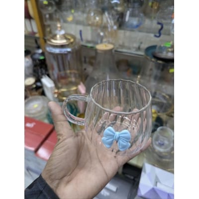 Picture of Aesthetic Japanese Style Pumpkin Shaped Glass Coffee Mug Featuring a Cute 3D Blue Bowknot Decoration Heat Resistant Borosilicate Glass Tea Cup with Large Ergonomic Handle for Elegant Home Office Beverage Service Decor.-Multicolor