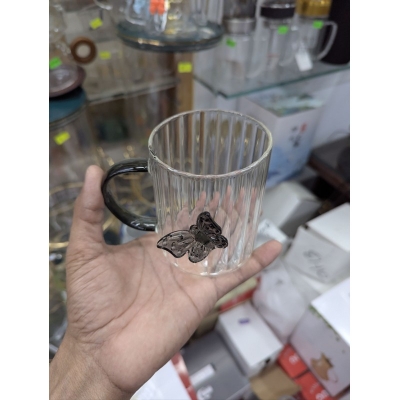 Picture of Premium 3D Butterfly Striped Borosilicate Glass Mug with Creative Colored Handle and Heat-Resistant Design for Coffee, Tea, Milk, Juice - Perfect Gift Idea for Home, Office, Wedding, and Birthdays (400ml Capacity).-Multicolor