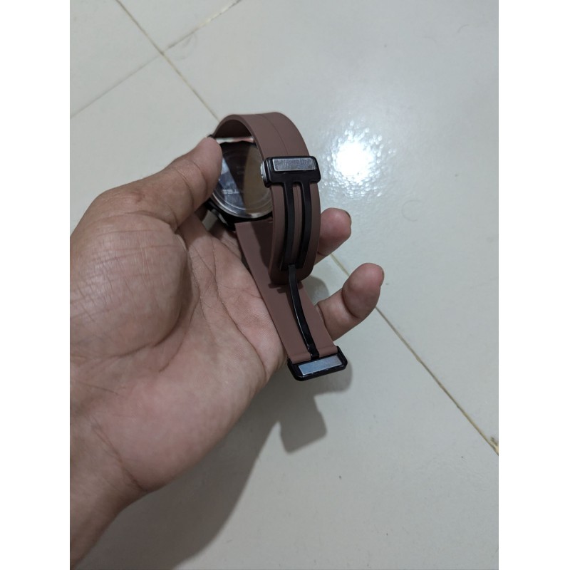 Picture of Premium Gents Watch 2002 featuring a stylish brown silicone belt and automatic mechanical skeleton movement, perfect for professional men looking for a sophisticated, luxury accessory in Bangladesh at best price today.-Brown