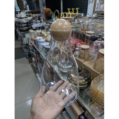 Picture of Borosilicate Glass Decanter Carafe with Natural Wooden Ball Stopper, Transparent Pitcher for Serving Water, Wine, Juice, or Whiskey, Modern Stylish Tabletop Beverage Server for Home Dining and Luxury Bar Decor.-Multicolor