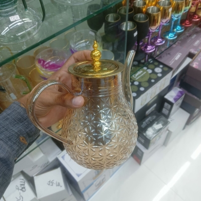 Picture of High Borosilicate Resistant tea kettlee golden colour stainless steem lid and infuser , Large Capacity, High Aesthetic Value, Household Teapot, Juice, Beverage, Light Waight 620 ml-Gold