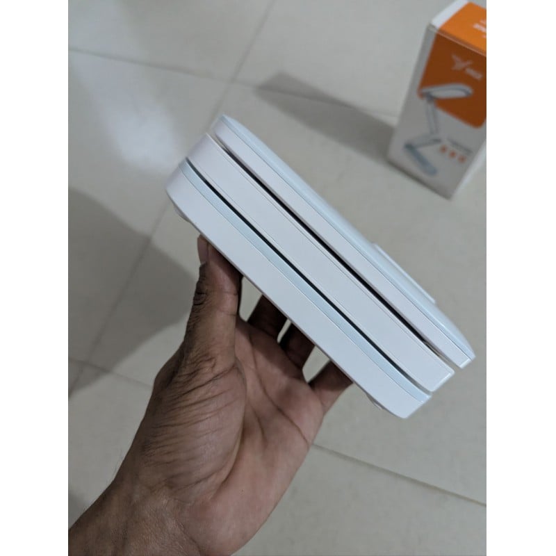 Picture of Yage YG-T125 Rechargeable LED Desk Lamp with 1200mAh Battery, 3 Brightness Levels, Eye-Caring Flicker-Free Technology, Foldable 3-Layer Design, USB Charging, Portable Table Light for Students, Home Office, Reading and Study Purposes.-White