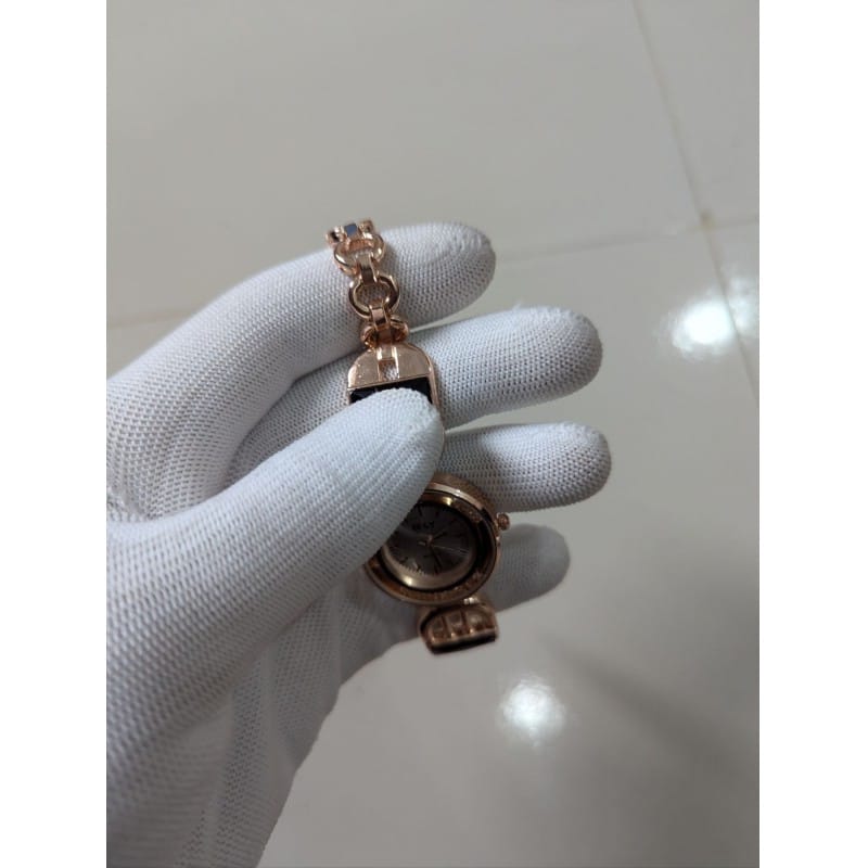 Picture of Elegant Rose Gold Women's Bracelet Watch featuring a Luxury Quartz Analog Movement, Durable Stainless Steel Chain, and Stylish Black Enamel Accents for Formal Events, Casual Wear, and Premium Gifting Occasions.-Multicolor