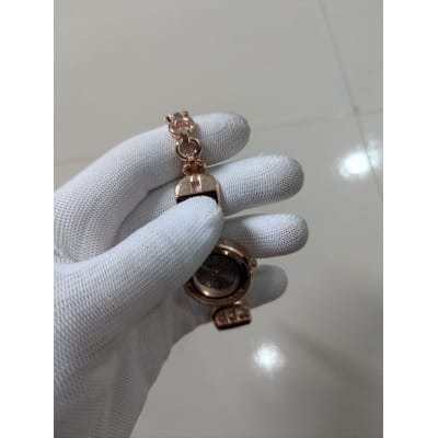 Picture of Elegant Rose Gold Women's Bracelet Watch featuring a Luxury Quartz Analog Movement, Durable Stainless Steel Chain, and Stylish Black Enamel Accents for Formal Events, Casual Wear, and Premium Gifting Occasions.-Multicolor