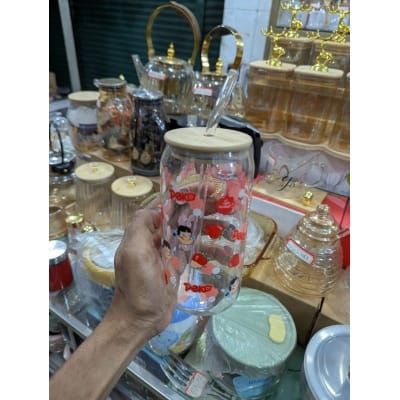 Picture of Official Fujiya Peko-chan Can Shaped Glass Tumbler Featuring Aesthetic Strawberry Graphics, Complete with Sustainable Bamboo Lid and Reusable Clear Glass Straw, Ideal 16oz Drinking Jar for Iced Coffee and Fruit Smoothies.-Multicolor