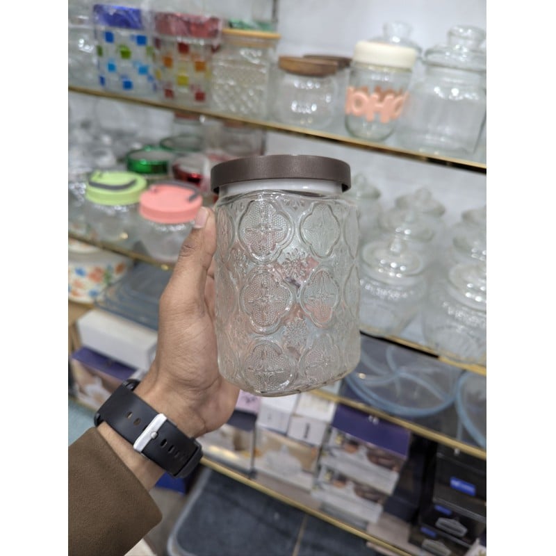Picture of Premium Airtight Glass Cookie Jar with Decorative Brown Metal Lid for Kitchen Countertop Storage of Fresh Homemade Chocolate Chip Biscuits, Snacks, and Pantry Essentials with Retro Embossed Floral Pattern Style Design.-Multicolor